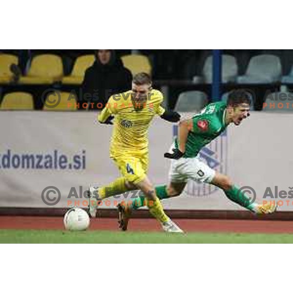 Gaber Dobrovljc and Radivoj Bosic in action during Prva Liga Telekom Slovenije 2020-2021 football match between Domzale and Olimpija in Domzale, Slovenia on November 29, 2020
