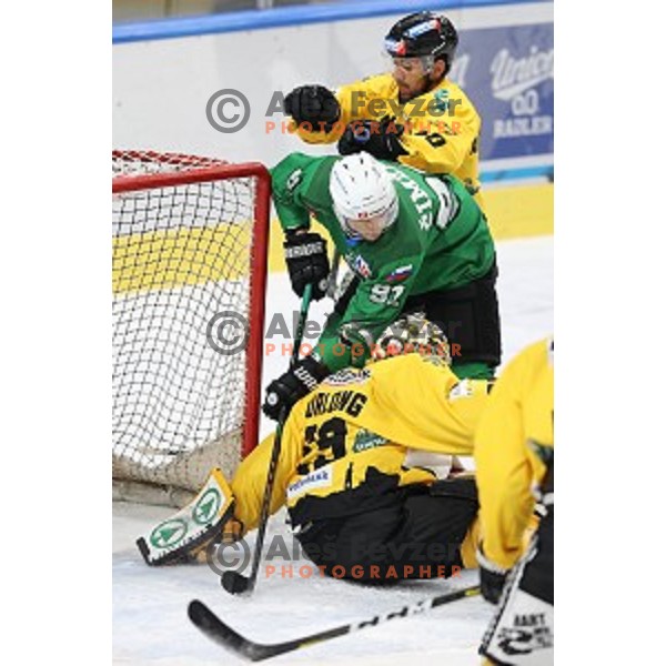 Colin Keith Furlong and Tadej Cimzar of SZ Olimpija in action during Alps League ice-hockey match between SZ Olimpija and Pustertal in Ljubljana, Slovenia on December 1, 2020