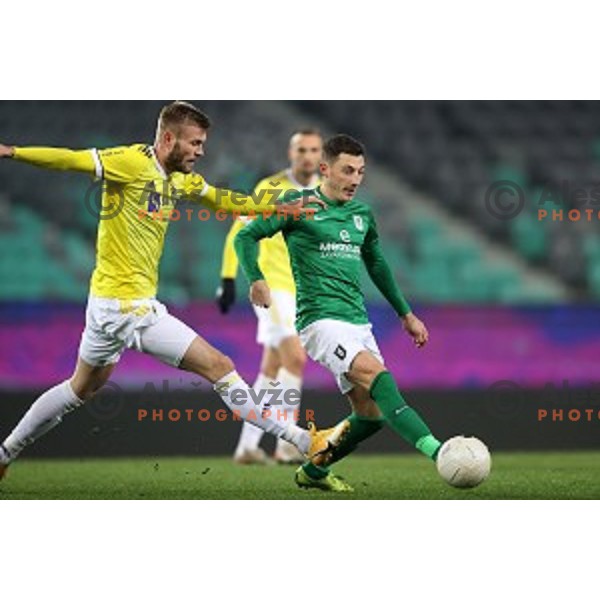 Alexandru Cretu and Mario Kvesic in action during Prva Liga Telekom Slovenije 2020-2021 football match between Olimpija and Maribor in SRC Stozice, Ljubljana, Slovenia on December 3, 2020