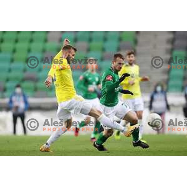 Alexabdru Cretu and Djordje Ivanovic in action during Prva Liga Telekom Slovenije 2020-2021 football match between Olimpija and Maribor in SRC Stozice, Ljubljana, Slovenia on December 3, 2020