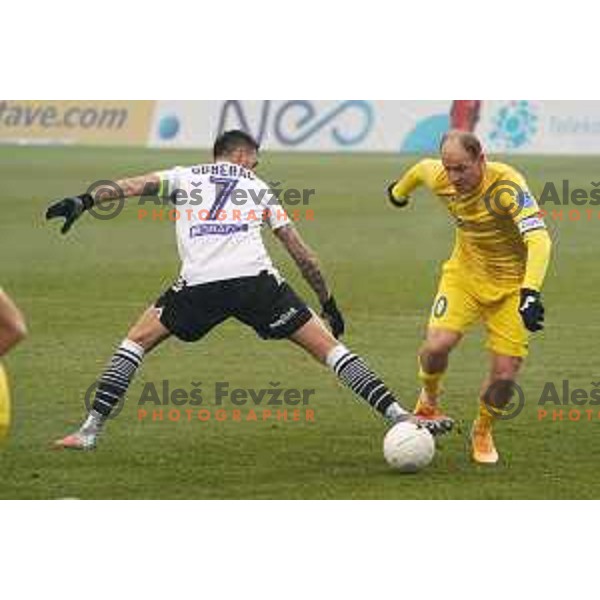 Ivica Guberac and Senijad Ibricic in action during Prva Liga Telekom Slovenije 2020-2021 football match between Domzale and Koper in Domzale on December 5, 2020