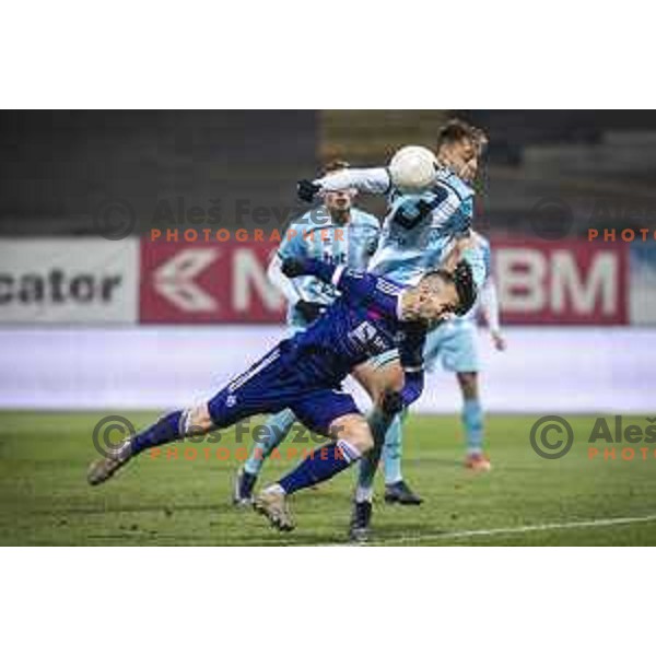 Tine Kavcic vs Jasmin Mesanovic in action during Prva liga Telekom Slovenije football match between Maribor and Gorica in Ljudski vrt, Maribor, Slovenia on December 6, 2020