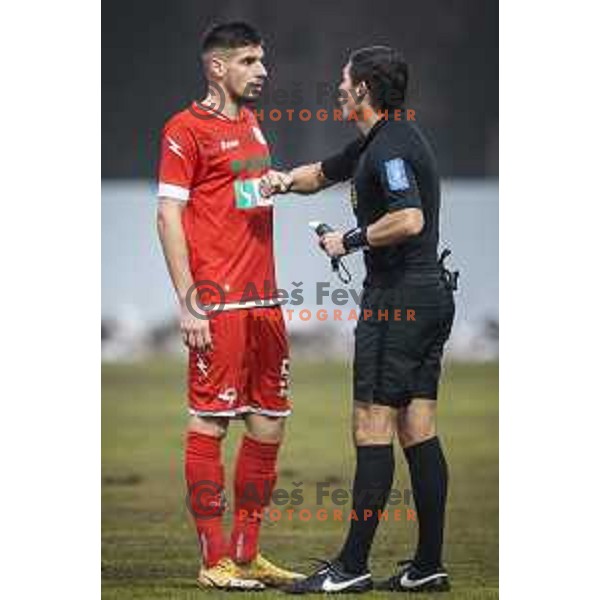 Emir Azemovic and referee Roberto Ponis in action during Prva liga Telekom Slovenije football match between Aluminij and Bravo in Kidricevo, Slovenia on December 12, 2020