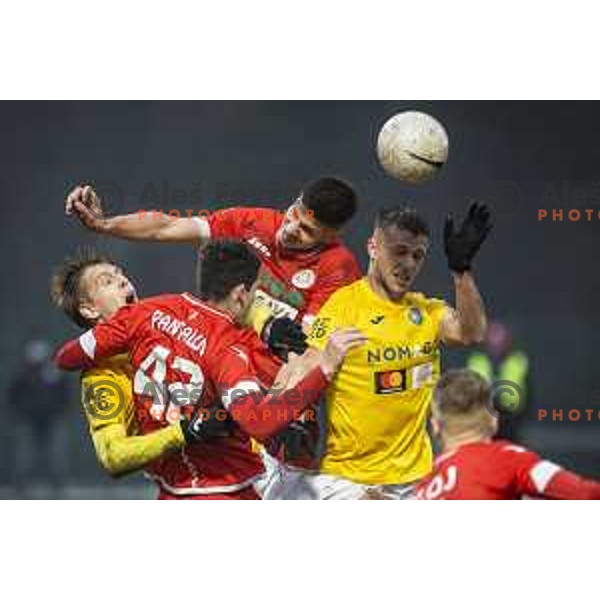 Rok Kidric and Mustafa Nukic in action during Prva liga Telekom Slovenije football match between Aluminij and Bravo in Kidricevo, Slovenia on December 12, 2020