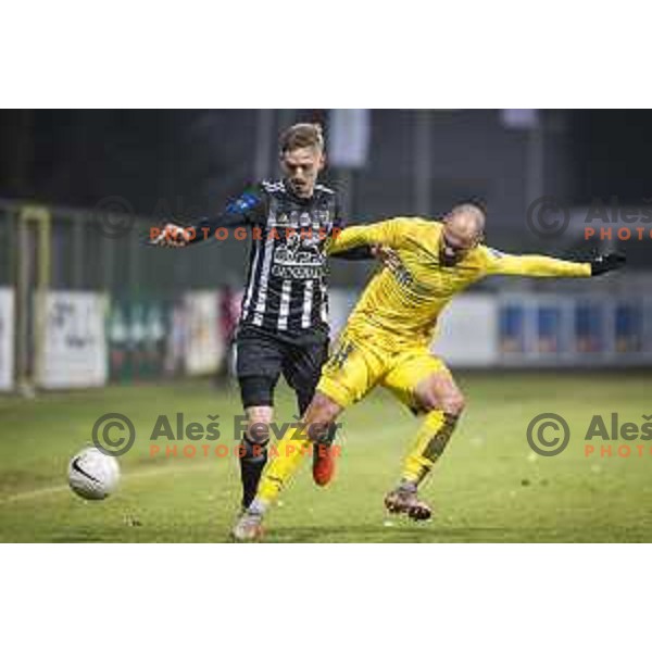 Zan Karnicnik vs Tonci Mujan in action during Prva liga Telekom Slovenije football match between Mura and Aluminij in Fazanerija, Murska Sobota, Slovenia on December 13, 2020