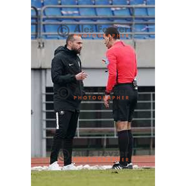 Nino Skender of Olimpija and referee Rade Obrenovic during Prva Liga Telekom Slovenije 2020-2021 football match between Bravo and Olimpija in Ljubljana, Slovenia on December 15, 2020