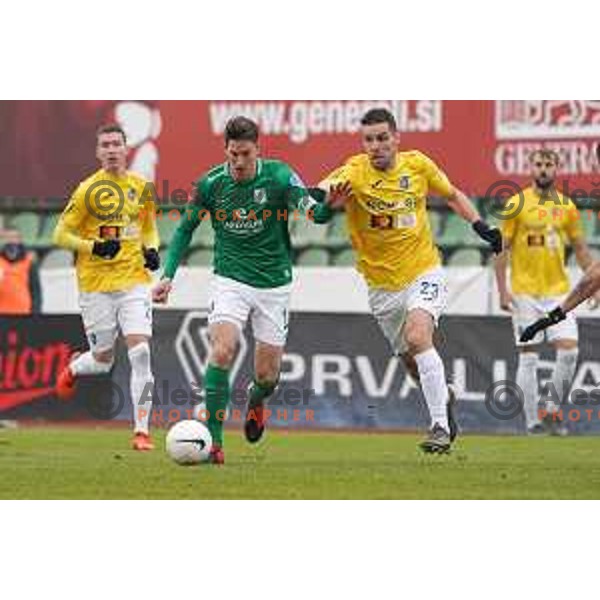 Andres Vombergar and Luka Zinko in action during Prva Liga Telekom Slovenije 2020-2021 football match between Bravo and Olimpija in Ljubljana, Slovenia on December 15, 2020