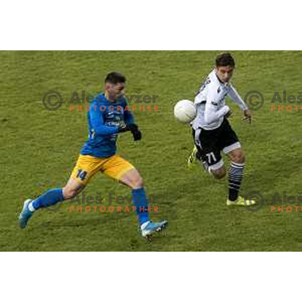Mico Kuzmanovic and Tilen Mlakar in action during Prva Liga Telekom Slovenije 2020-2021 football match between Celje and Koper in Celje, Slovenia on December 16, 2020