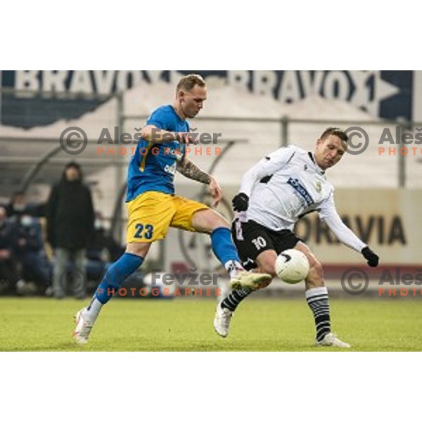 Zan Benedicic and Dare Vrsic in action during Prva Liga Telekom Slovenije 2020-2021 football match between Celje and Koper in Celje, Slovenia on December 16, 2020