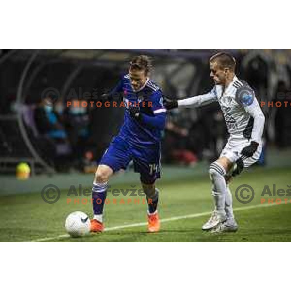 Rene Mihelic vs Tomo Horvat in action during Prva liga Telekom Slovenije football match between Maribor and Mura in Ljudski vrt, Maribor, Slovenia on December 17, 2020