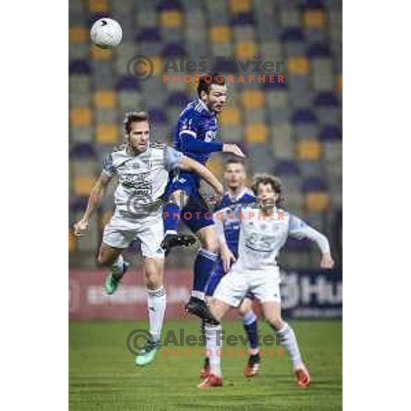 Jure Travner vs Denis Klinar in action during Prva liga Telekom Slovenije football match between Maribor and Mura in Ljudski vrt, Maribor, Slovenia on December 17, 2020