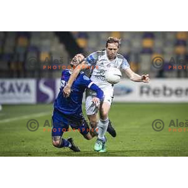 Denis Klinar vs Jure Travner in action during Prva liga Telekom Slovenije football match between Maribor and Mura in Ljudski vrt, Maribor, Slovenia on December 17, 2020