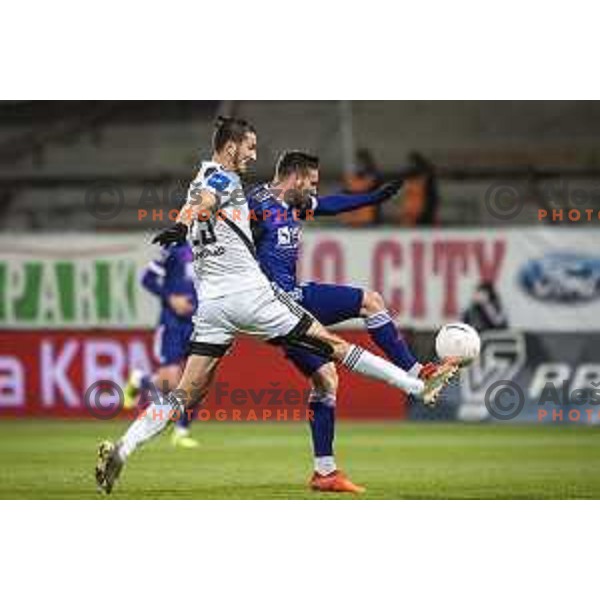 Dragan Lovric vs Aljosa Matko in action during Prva liga Telekom Slovenije football match between Maribor and Mura in Ljudski vrt, Maribor, Slovenia on December 17, 2020
