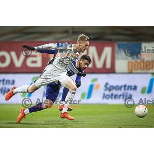 Zan Karnicnik vs Aljosa Matko in action during Prva liga Telekom Slovenije football match between Maribor and Mura in Ljudski vrt, Maribor, Slovenia on December 17, 2020