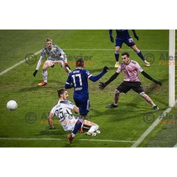 Zan Karnicnik and Marko Zalokar in action during Prva liga Telekom Slovenije football match between Maribor and Mura in Ljudski vrt, Maribor, Slovenia on December 17, 2020