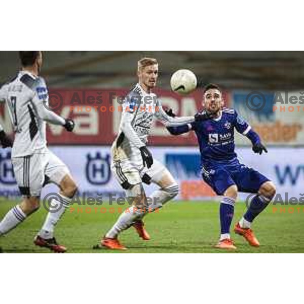 Zan Karnicnik vs Aljosa Matko in action during Prva liga Telekom Slovenije football match between Maribor and Mura in Ljudski vrt, Maribor, Slovenia on December 17, 2020
