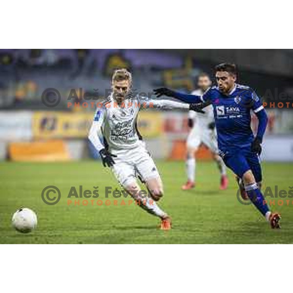 Zan Karnicnik vs Aljosa Matko in action during Prva liga Telekom Slovenije football match between Maribor and Mura in Ljudski vrt, Maribor, Slovenia on December 17, 2020