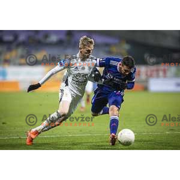 Zan Karnicnik vs Aljosa Matko in action during Prva liga Telekom Slovenije football match between Maribor and Mura in Ljudski vrt, Maribor, Slovenia on December 17, 2020