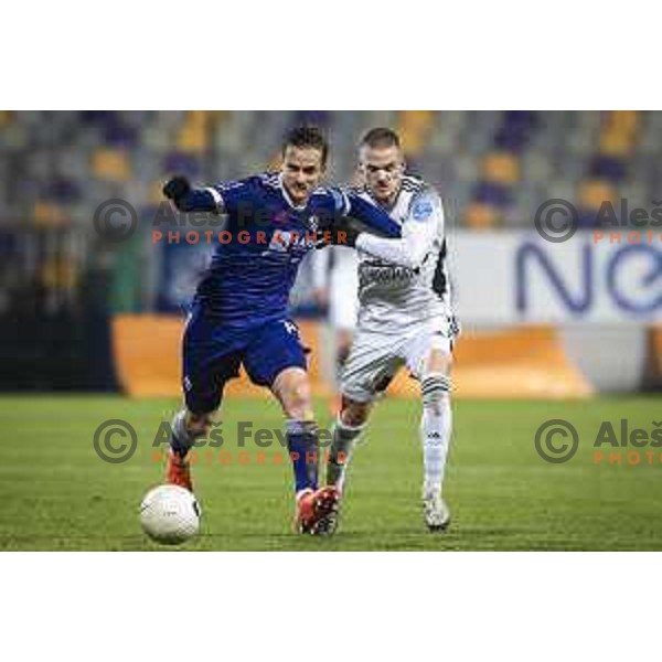 Rene Mihelic vs Tomi Horvat in action during Prva liga Telekom Slovenije football match between Maribor and Mura in Ljudski vrt, Maribor, Slovenia on December 17, 2020