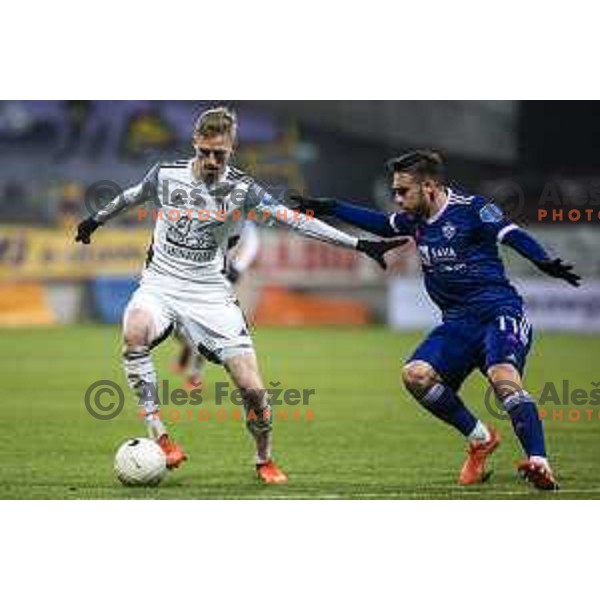 Zan Karnicnik vs Aljosa Matko in action during Prva liga Telekom Slovenije football match between Maribor and Mura in Ljudski vrt, Maribor, Slovenia on December 17, 2020