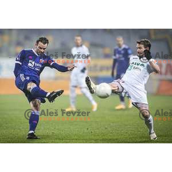 Denis Klinar vs Jure Matjasic in action during Prva liga Telekom Slovenije football match between Maribor and Aluminij in Ljudski vrt, Maribor, Slovenia on December 20, 2020