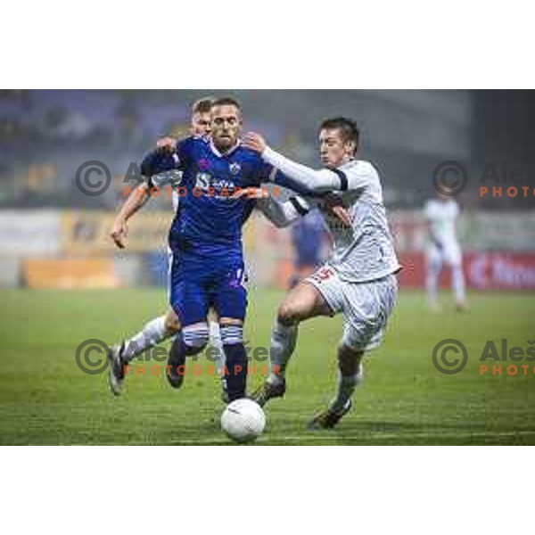 Andrej Kotnik vs Luka Petek in action during Prva liga Telekom Slovenije football match between Maribor and Aluminij in Ljudski vrt, Maribor, Slovenia on December 20, 2020