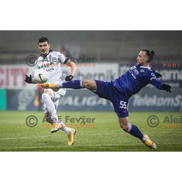 Emir Azemovic vs Spiro Pericic in action during Prva liga Telekom Slovenije football match between Maribor and Aluminij in Ljudski vrt, Maribor, Slovenia on December 20, 2020