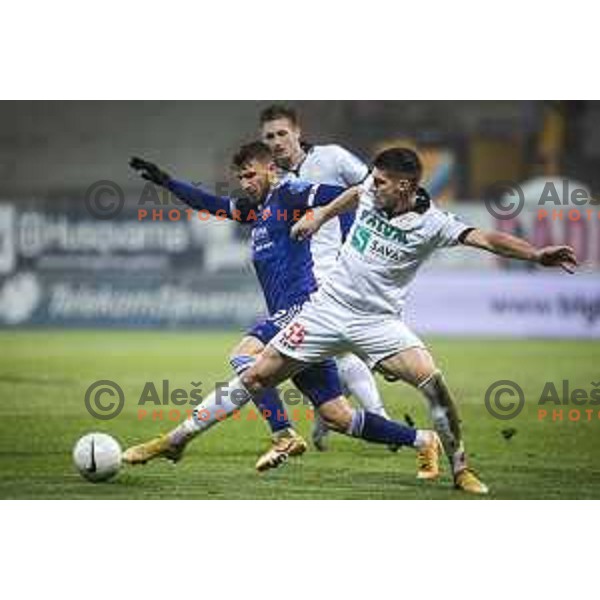 Jan Mlakar vs Emir Azemovic in action during Prva liga Telekom Slovenije football match between Maribor and Aluminij in Ljudski vrt, Maribor, Slovenia on December 20, 2020