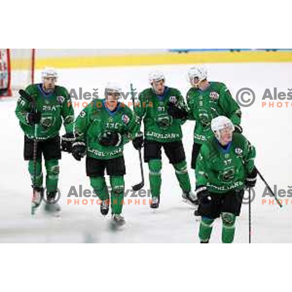 Anze Ropret, Tadej Cimzar, Ziga Pance and Miha Stebih of SZ Olimpija celebrate goal during Alps League ice-hockey match between SZ Olimpija and Feldkirch in Ljubljana, Slovenia on February 6, 2021