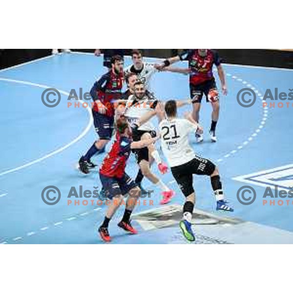 Ozgur Sarak and Gregor Potocnik in action during EHF European League Men 2020/21 handball match between Trimo Trebnje and Rhein Neckar Lowen in Ljubljana, Slovenia on February 9, 2021