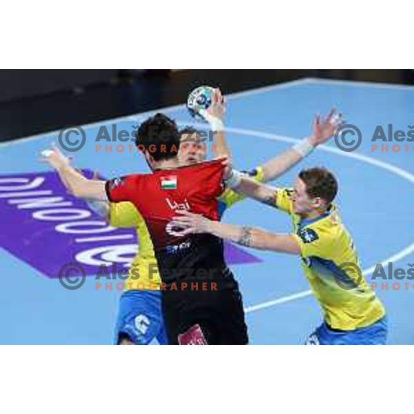 Mate Lekai and Tilen Kodrin in action during EHF Champions League handball match between Celje Pivovarna Lasko and Veszprem in Zlatorog Arena, Celje, Slovenia on February 11, 2021