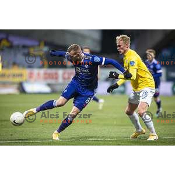 Alexandru Cretu and Sandi Ogrinec in action during Prva liga Telekom Slovenije football match between Maribor and Bravo in Ljudski vrt, Maribor, Slovenia on February 13, 2021