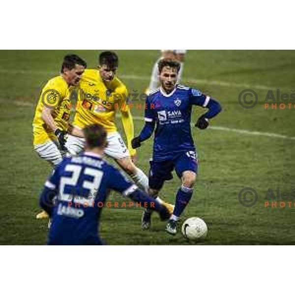 Andraz Kirm and Martin Kramaric vs Jan Repas in action during Prva liga Telekom Slovenije football match between Maribor and Bravo in Ljudski vrt, Maribor, Slovenia on February 13, 2021