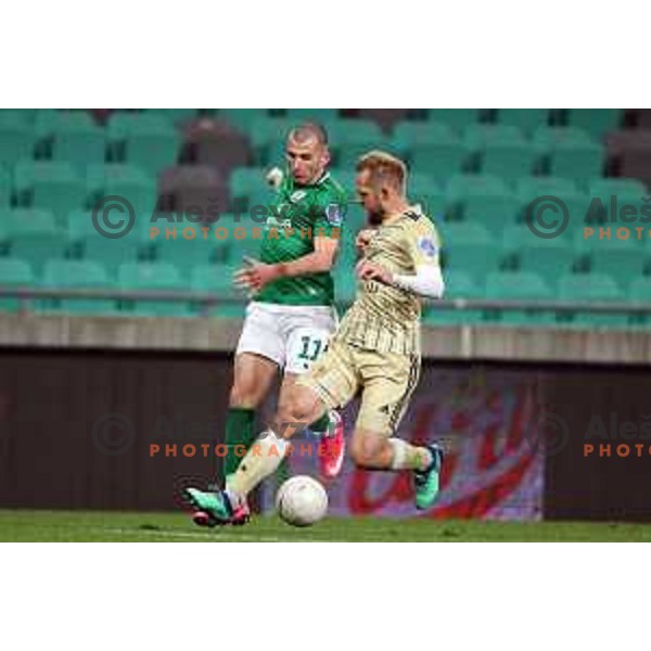 Mihailo Perovic and Jure Travner in action during Prva Liga Telekom Slovenië 2020-2021 football match between Olimpija and Mura in SRC Stozice, Ljubljana, Slovenia on February 14, 2021