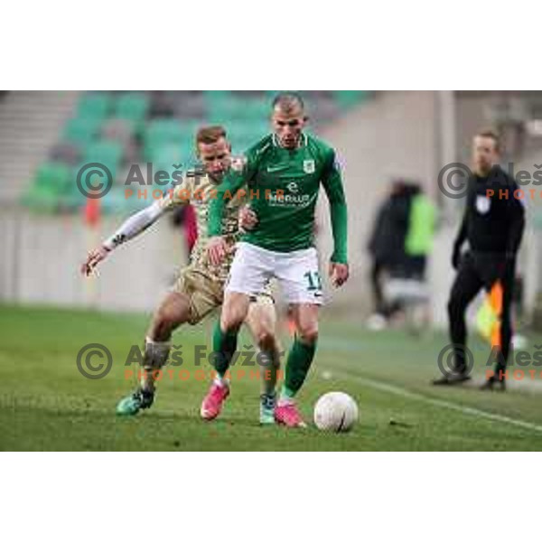Mihailo Perovic and Jure Travner in action during Prva Liga Telekom Slovenië 2020-2021 football match between Olimpija and Mura in SRC Stozice, Ljubljana, Slovenia on February 14, 2021