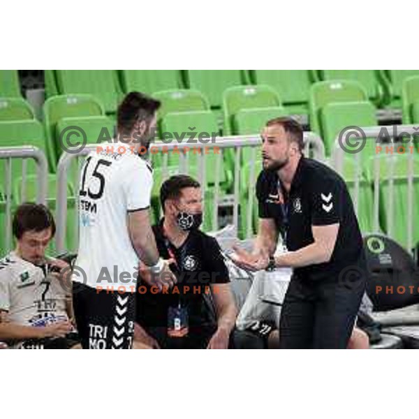 Dino Hamidovic and Uros Zorman, head coach of Trimo in action during EHF European League Men 2020/21 handball match between Trimo Trebnje and Gudme in Ljubljana, Slovenia on February 23, 2021