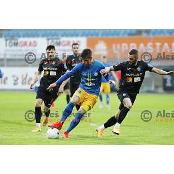 Luka Kerin and Almin Kurtovic in action during Prva liga Telekom Slovenije 2020-2021 football match between Celje and Bravo in Celje on February 24, 2021
