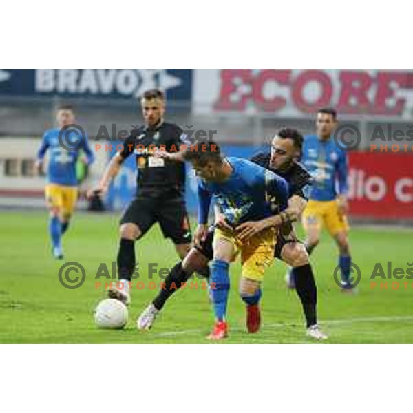 Luka Kerin and Vanja Drkusic in action during Prva liga Telekom Slovenije 2020-2021 football match between Celje and Bravo in Celje on February 24, 2021