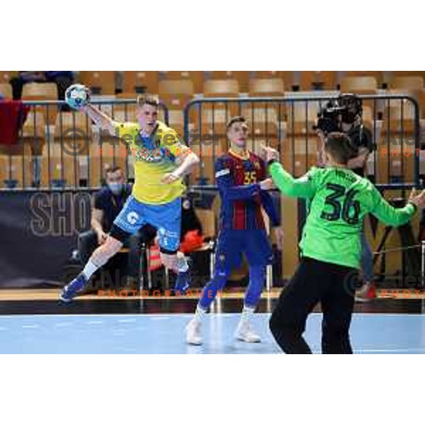 Tadej Mazej and Domen Makuc in action during EHF Champions League handball match between Celje Pivovarna Lasko and Barcelona in Zlatorog Arena, Celje, Slovenia on February 24, 2021