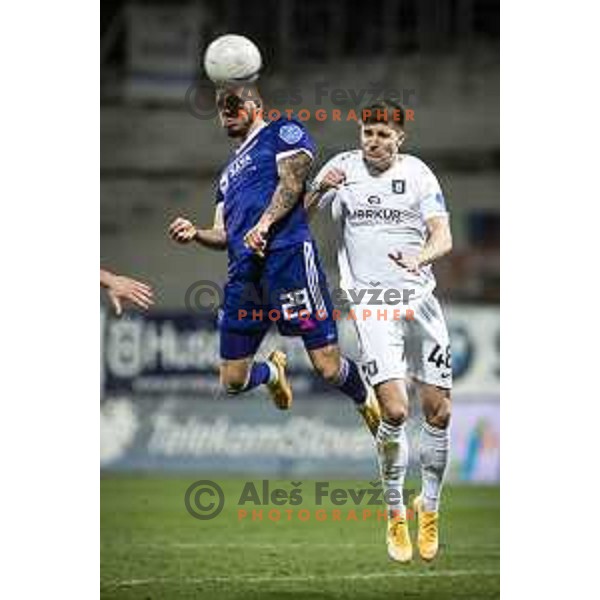 Jan Mlakar vs Jan Andrejasic in action during Prva liga Telekom Slovenije football match between Maribor and Olimpija in Ljudski vrt, Maribor, Slovenia on February 27, 2021