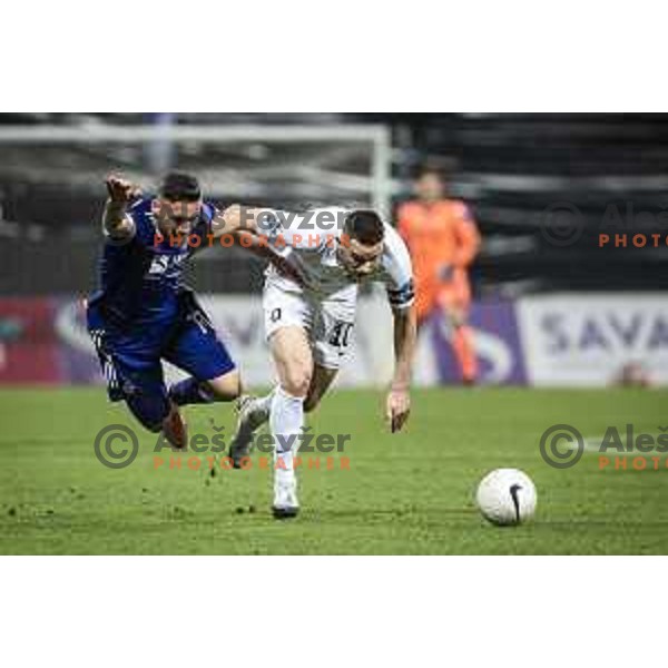 Aljosa Matko vs Timi Max Elsnik in action during Prva liga Telekom Slovenije football match between Maribor and Olimpija in Ljudski vrt, Maribor, Slovenia on February 27, 2021