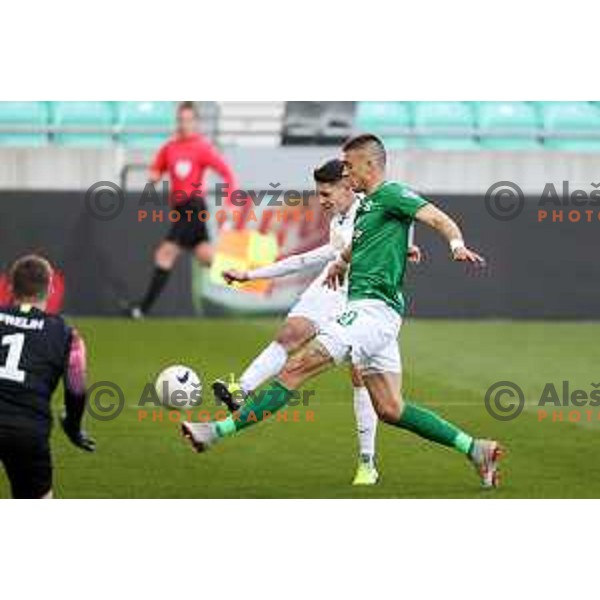 Ester Sokler and Vujadin Savic in action during Prva Liga Telekom Slovenije 2020-2021 football match between Olimpija and Celje in SRC Stozice, Ljubljana, Slovenia on March 7, 2021