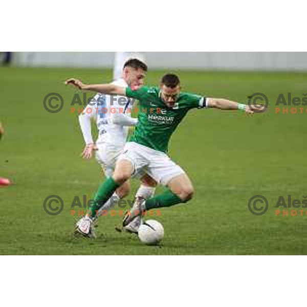 Mico Kuzmanovic and Timi Max Elsnik in action during Prva Liga Telekom Slovenije 2020-2021 football match between Olimpija and Celje in SRC Stozice, Ljubljana, Slovenia on March 7, 2021