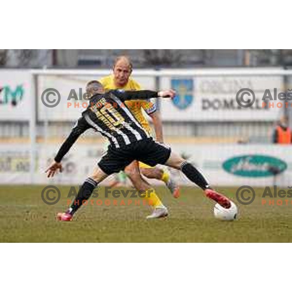 Nino Kouter and Senijad Ibrcic in action during Prva Liga Telekom Slovenije 2020-2021 football match between Domzale and Mura in Domzale, Slovenia on March 10, 2021
