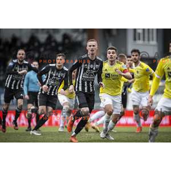 Zan Karnicnik vs Blaz Vrhovec in action during Prva liga Telekom Slovenije football match between Mura and Maribor in Fazanerija, Murska Sobota, Slovenia on March 14, 2021