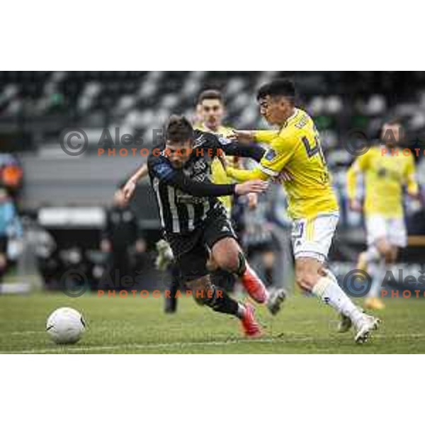 Amadej Marosa and Ignacio Guerrico in action during Prva liga Telekom Slovenije football match between Mura and Maribor in Fazanerija, Murska Sobota, Slovenia on March 14, 2021