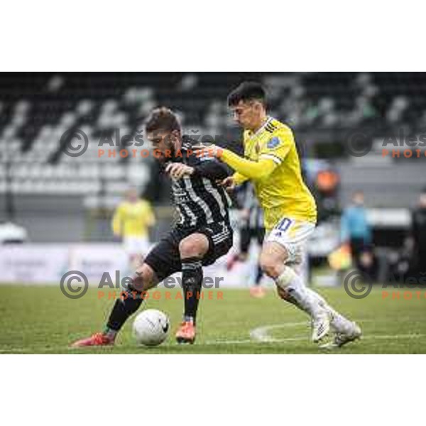 Amadej Marosa and Ignacio Guerrico in action during Prva liga Telekom Slovenije football match between Mura and Maribor in Fazanerija, Murska Sobota, Slovenia on March 14, 2021