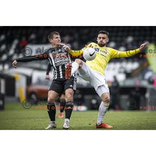 Klemen Sturm vs Aljosa Matko in action during Prva liga Telekom Slovenije football match between Mura and Maribor in Fazanerija, Murska Sobota, Slovenia on March 14, 2021