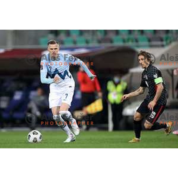 Josip Ilicic and Luka Modric in action during FIFA World Cup Qualifying round match between Slovenia and Croatia in Ljubljana, Slovenia on March 24, 2021