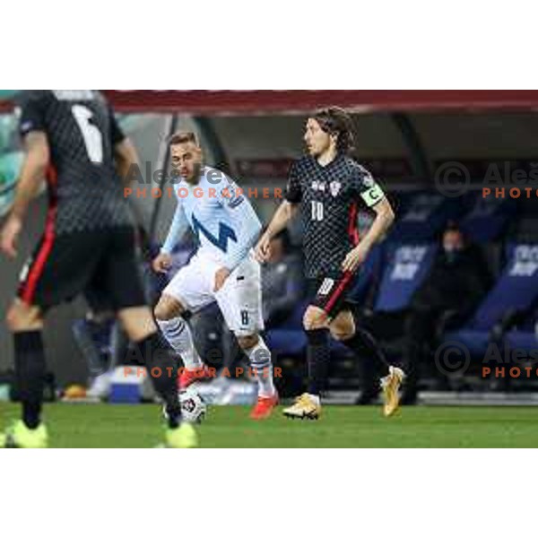 Luka Modric in action during FIFA World Cup Qualifying round match between Slovenia and Croatia in Ljubljana, Slovenia on March 24, 2021